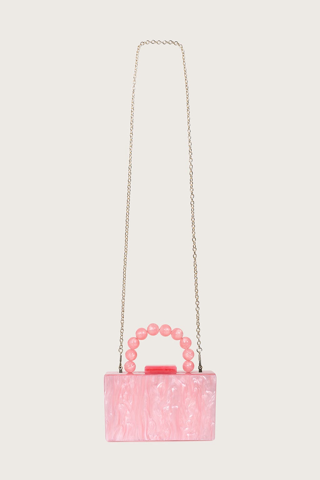 REYA Bead Handle Marbled Box Clutch Bag in Pink