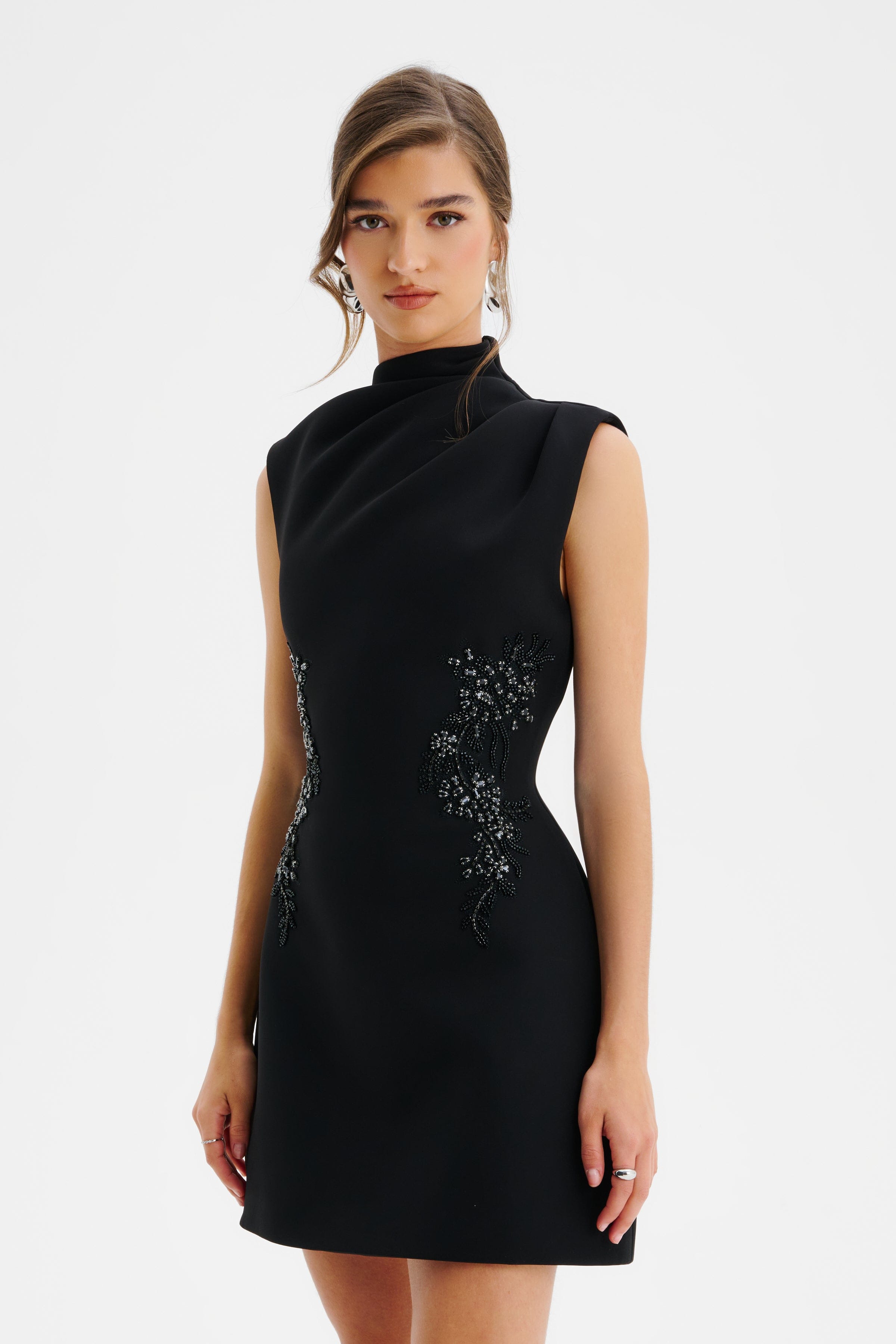 AMBAR Asymmetric High Neck Embellished Tulip Mini Dress in Black